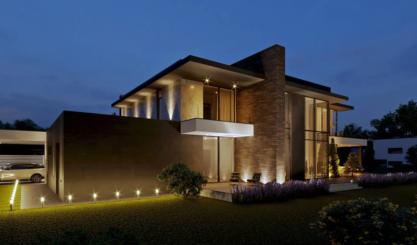 Illuminated backyard landscape at dusk with layered outdoor lighting