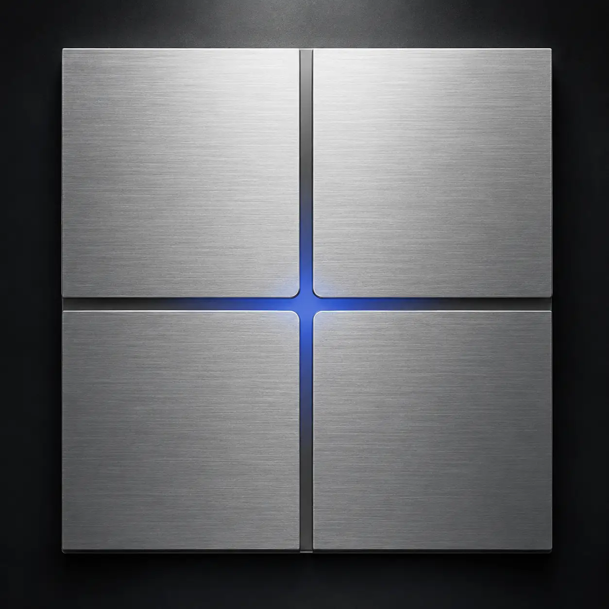 Brushed-aluminum Basalte keypad with four touch surfaces and a softly lit blue center