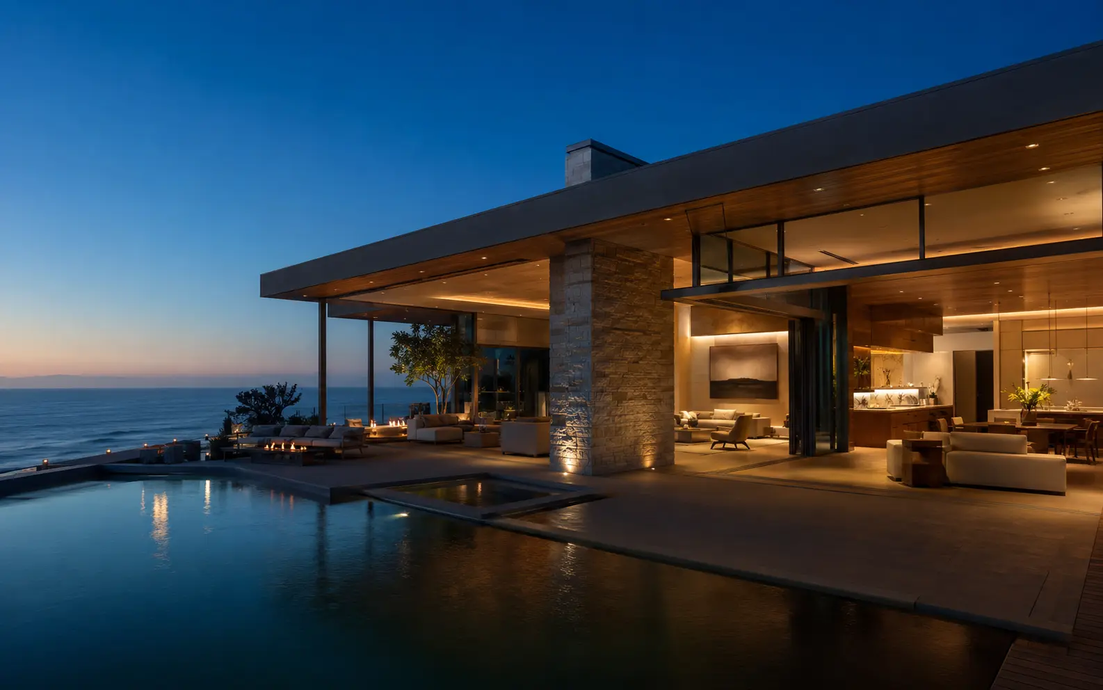 Pacific Horizon Residence, a contemporary coastal home with an infinity pool at blue hour